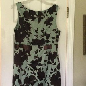 Dress is fully lined with back hidden zipper. 100% polyester.